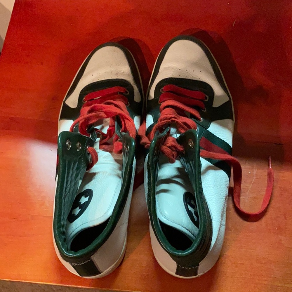 Green white and red sneakers